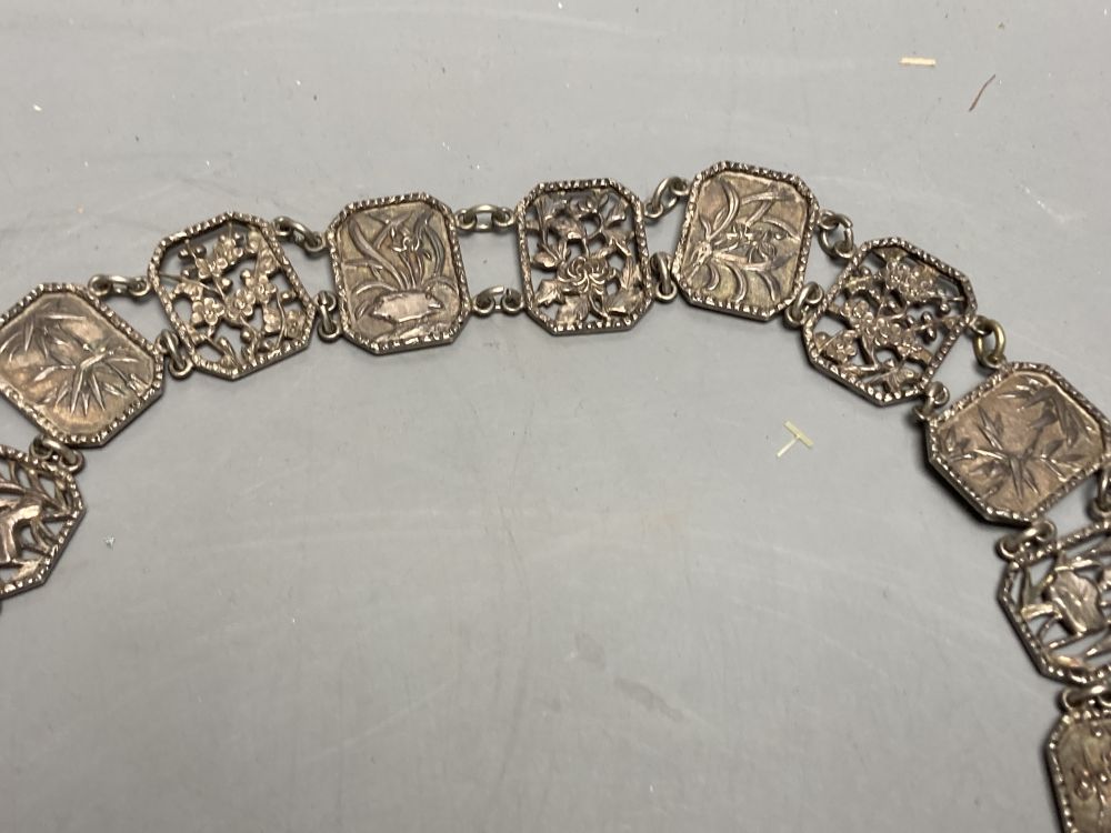 An early 20th century Chinese Export white metal belt by Wang Hing, Hong Kong and other items.